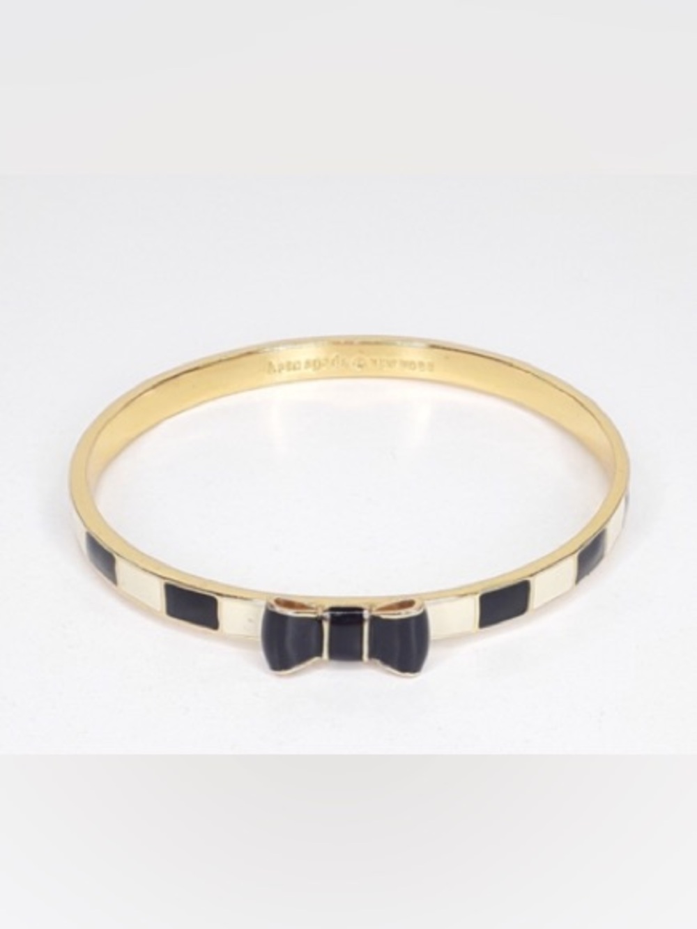 kate spade Take a Bow Gold-Tone Black & Cream Enamel Bow Bangle